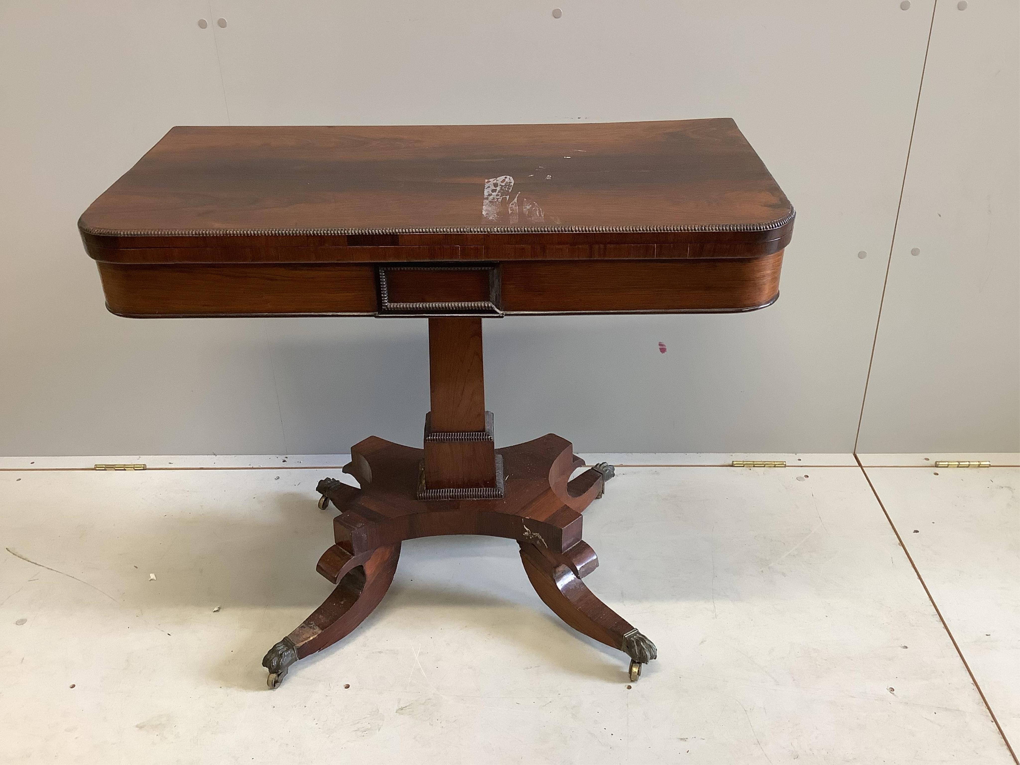 A Regency rectangular rosewood folding card table, width 91cm, depth 45cm, height 74cm. Condition - poor